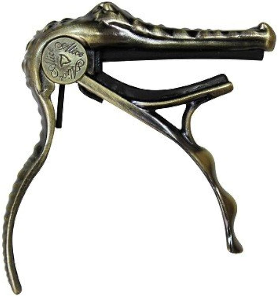 CAPO P/ GUITARRA CON FORMA DE COCODRILO COLOR BRONCE A007G/BR N