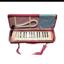MELODICA EXTREME 32 TECLAS 2 1/2 OCTAVAS ESTUCHE CON CIERRE ROSA N